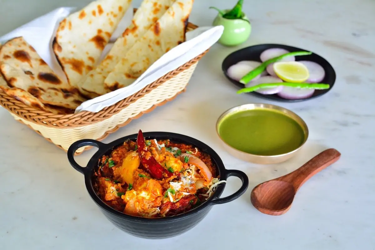 Biryani with a bowl of curry — Jaajam Restaurant, Udaipur