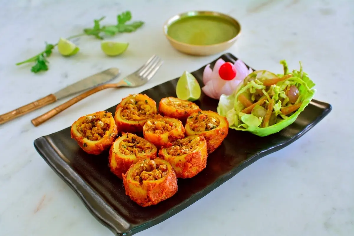Stuffed rolls, plated for the table — Jaajam Restaurant, Udaipur