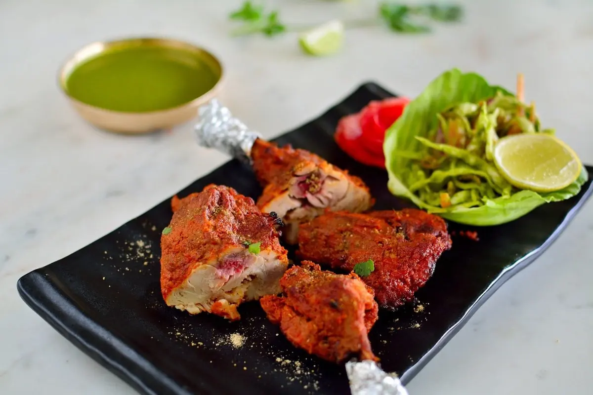 Tandoori chicken, charred at the edges — Jaajam Restaurant, Udaipur