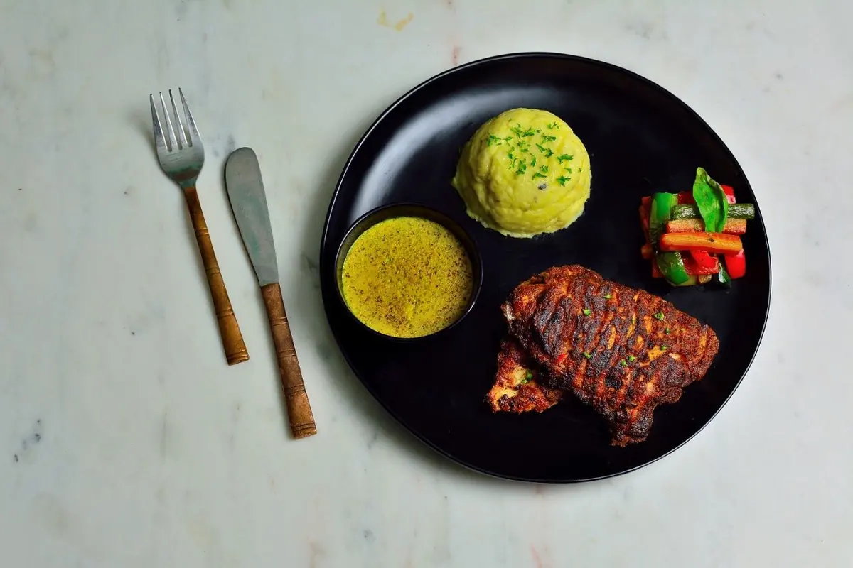 Continental grill with herb sauce — Jaajam Restaurant, Udaipur