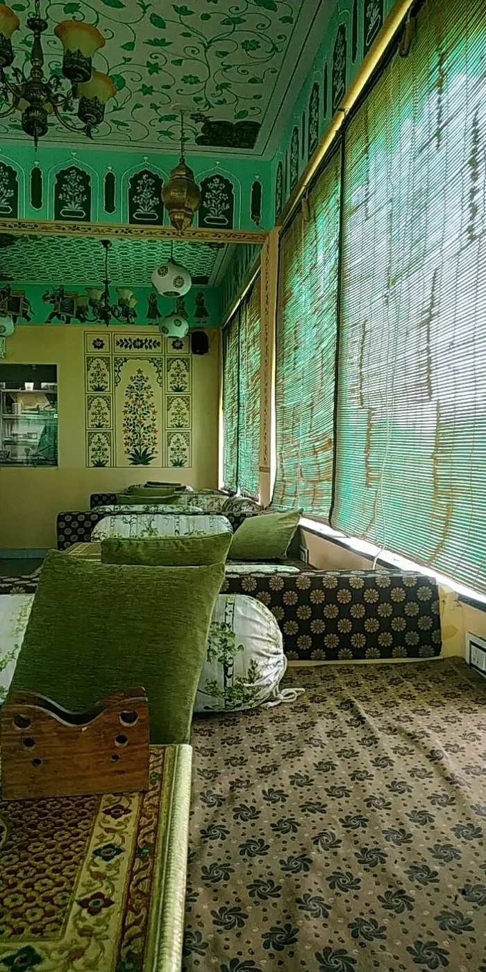 Traditional Rajasthani seating nook with block-printed upholstery at Jaajam