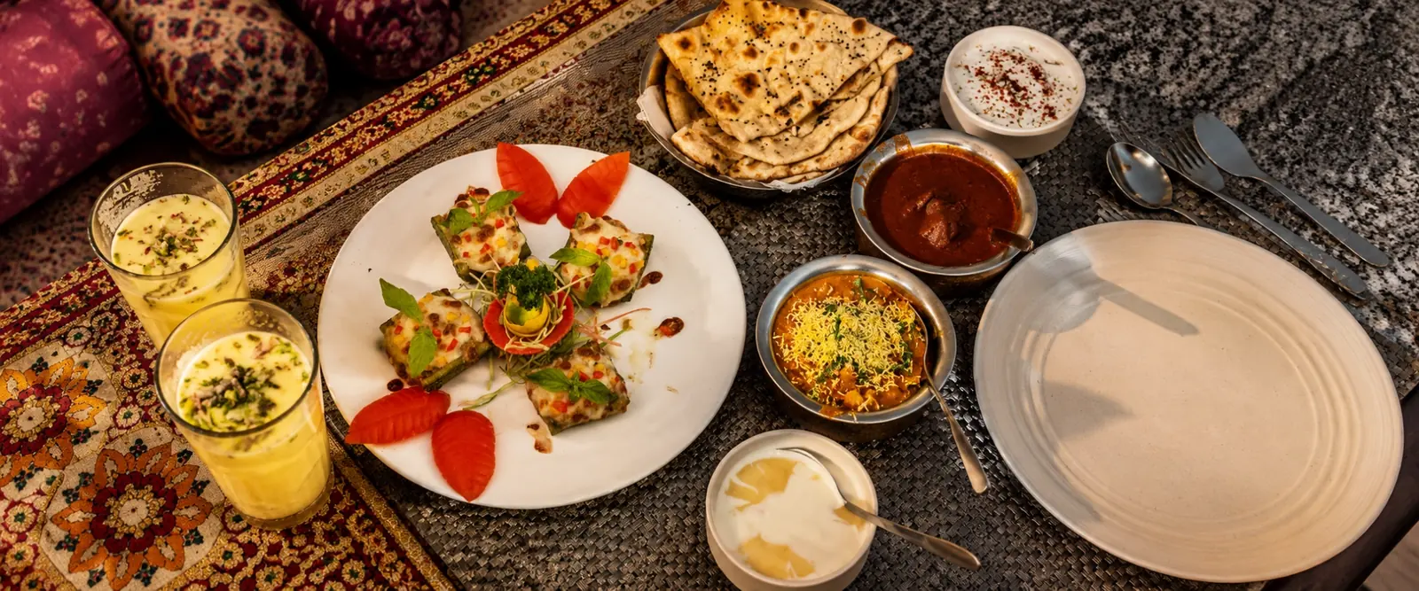 A Rajasthani spread laid out on a block-printed jaajam cloth