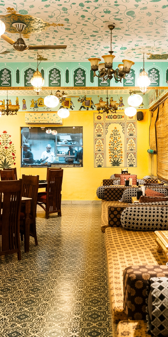 Traditional Rajasthani seating nook with block-printed upholstery at Jaajam